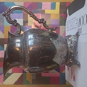 ONEIDA SILVER PATINATED FOOTED WATER PITCHER